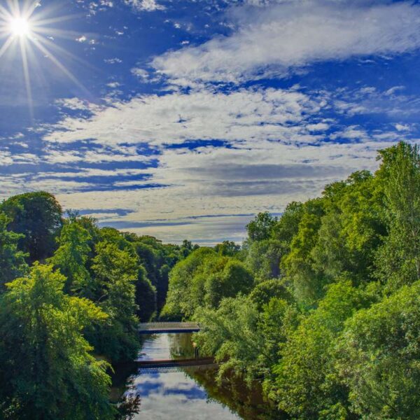 Sun shining above River Kelvin