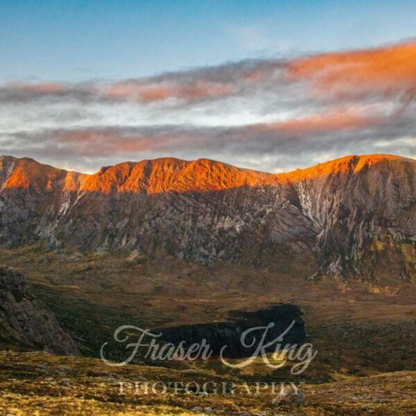 Glowing orange on 3 peaks of Beinn Liath Mhor